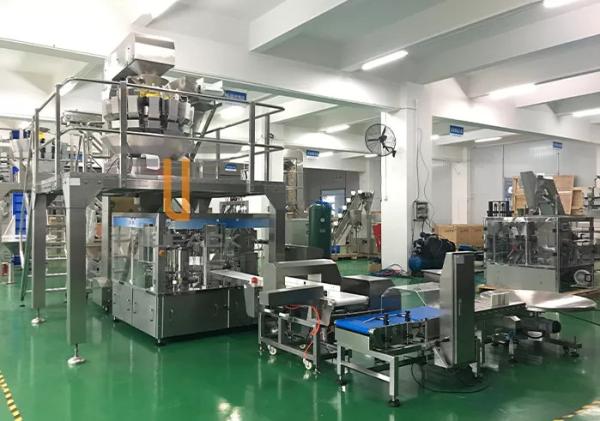 Premade Pouch Rotary Vacuum Packaging Machine For Potato Chips Cracker Frozen