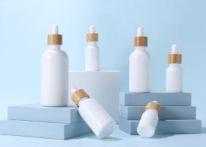 Quality Opal White Porcelain Ceramic 30ml 50ml Glass Dropper Bottle With Bamboo Cap wholesale