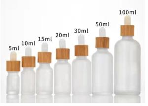 Quality JiaZi Luxury Cosmetic Dropper Bottles 5ml 10ml Perfume Oil With Bamboo Cap wholesale