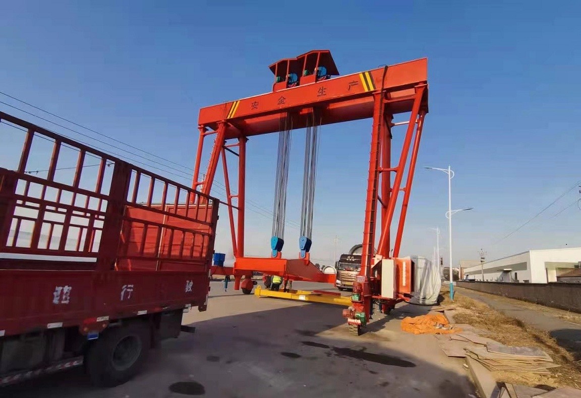 MG 100T universal gantry crane wind turbine head loading and unloading truck，100T tyred gantry crane