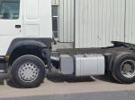Right-Hand Drive Sinotruk Tractor Truck 6*4 White Color 6800*2496*2950mm Seats