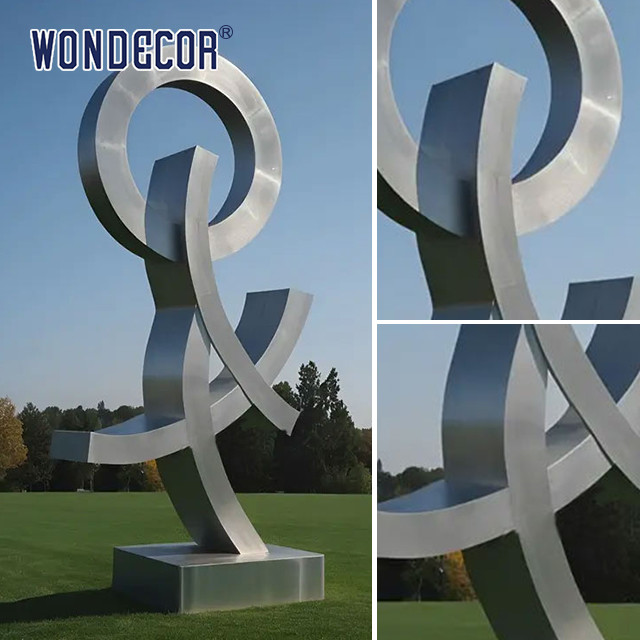 Large outdoor park geometric letter rusted steel sculpture
