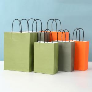 Quality Hot Style Fashion Blank Twist Handle Kraft Paper Shopping Bag with Hand Length Handle wholesale