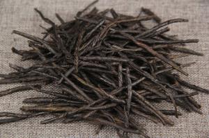 Quality Yunnan wild leaves kuding tea super high mountain qingshan green water kuding under fire tea taste bitter wholesale