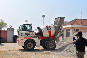 Quality 2 Cubic Meter Automatic Rotating Drum Cement Sand Mixer Concrete Carrier Truck wholesale