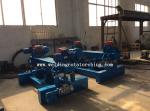 Up and down welding rotator