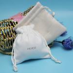 Custom Drawstring Jewelry Bag Faux Suede Material With Embossed Sliver Logo