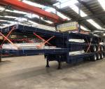 10t Grade Steel 3 Axle Flatbed Lowbed Semi Trailer for Construction Equipment
