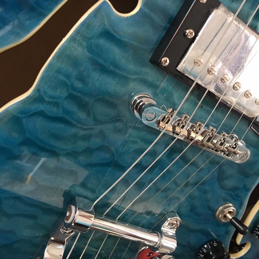 Semi hollow shell Archtop guitar Quilted maple trans-Blue with Bigsby