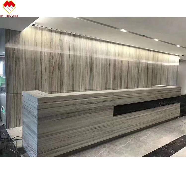 White Wood Look Marble Tiles Stair Follow Veins for a Versatile and Timeless Design