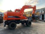 Doosan DH150 Used Wheel Excavator Moving By Tires