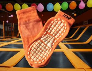 Quality Sky Zone Anti Slip Trampoline Safety Socks , Orange Breathable Grip Socks With Rubber Soles wholesale