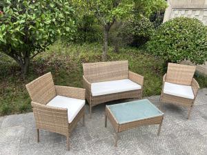Quality UV Resistant Rattan Sofa Waterproof Design Indoor Outdoor Sofa Table Chair Dining Desk Ottoman Furniture Set wholesale