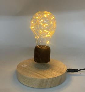 Quality round base wireless magnetic levitation desk lamp light night bulb wholesale