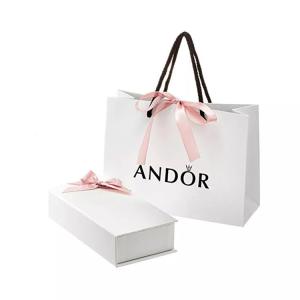 Quality Tear Resistant 80gsm-120gsm Kids Clothing Paper Bags Custom Logo wholesale