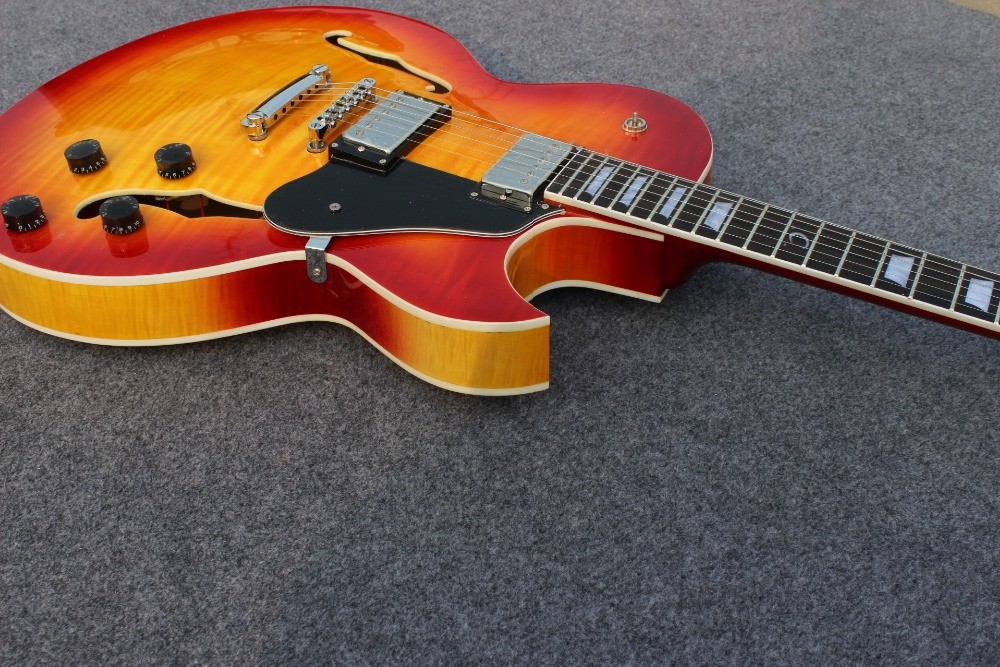 Hollow body ES137 jazz guitar with cherry burst color and chrome hardware