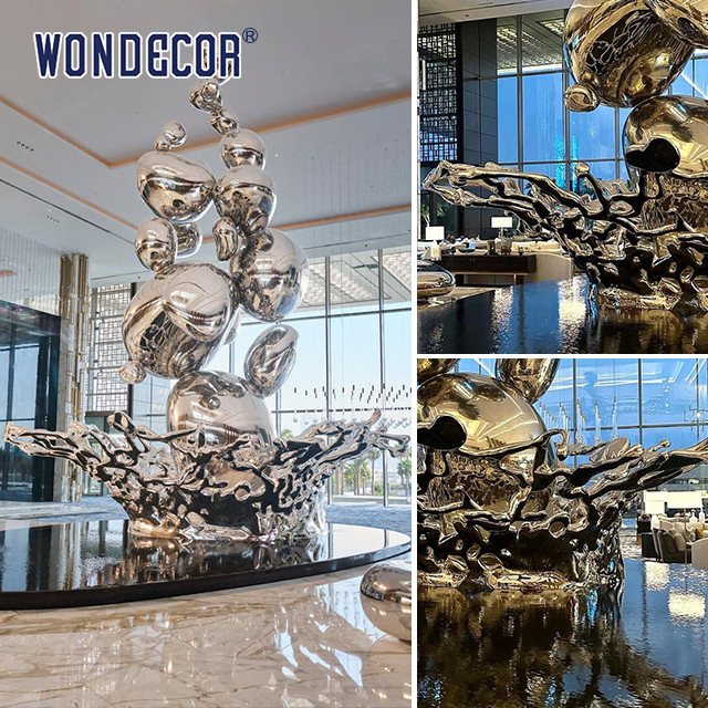 Large Forged Metal Sculpture Water Droplets And Splashes In Hotel Lobby