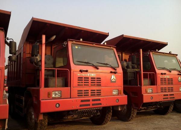 Unloading Dump Truck 371 hp driver 6x4 mining dump truck / tipper truck howo