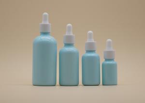 Quality Blue Coating Essential Oil Dropper Bottles White Ceramic Bottle For Personal Care wholesale