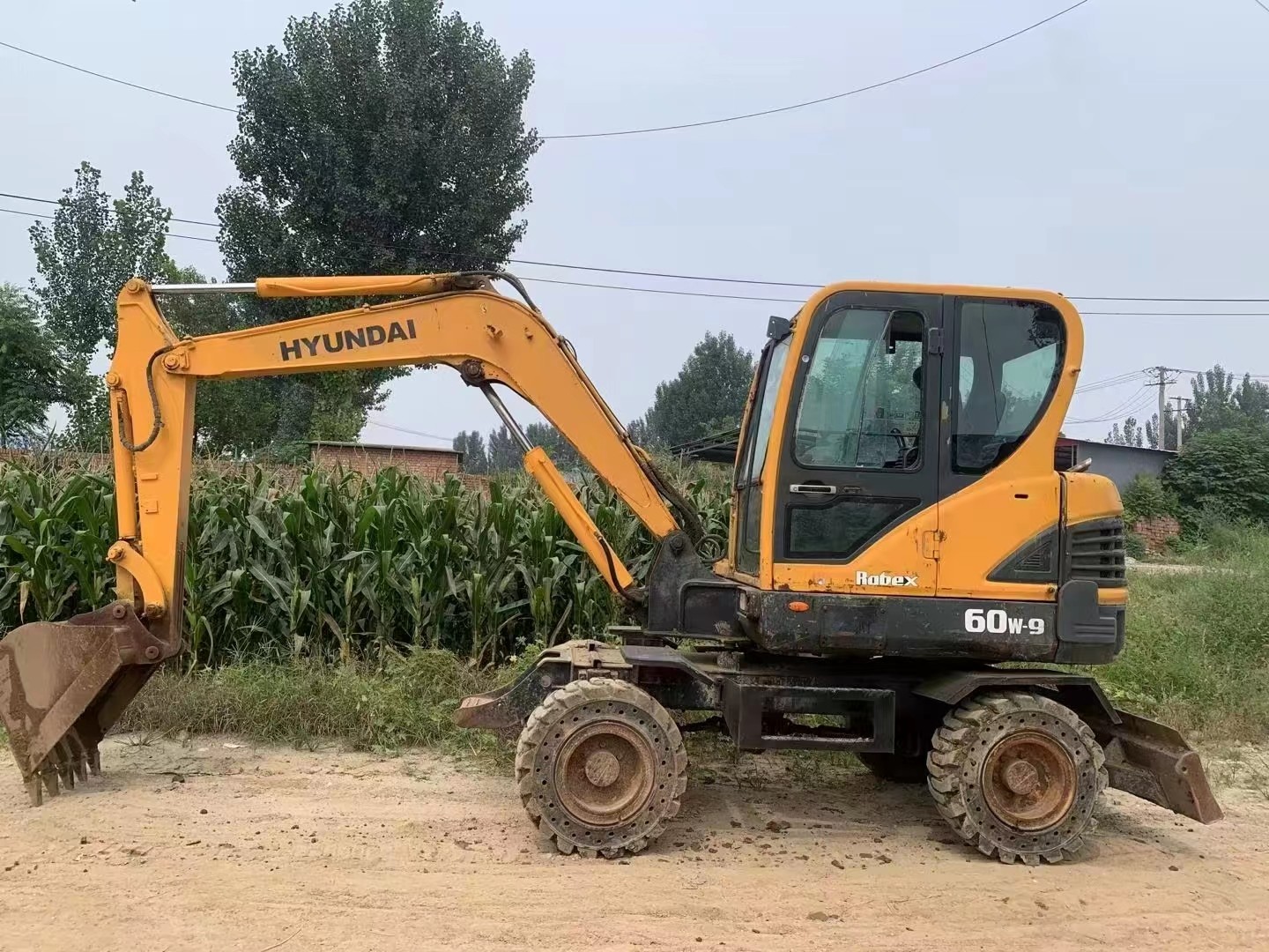 Used Wheel Excavator Hyundai 60W-9 Bucket capacity max. 0.21 m3