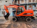 Doosan DH150 Used Wheel Excavator Moving By Tires