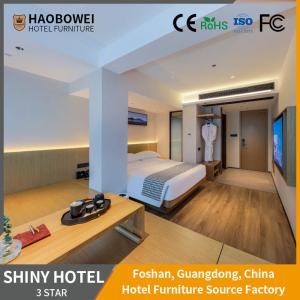 Quality 3 Star Foshan Hotel Furniture Luxury Style King Size Bedroom Set With Curved Backrest wholesale