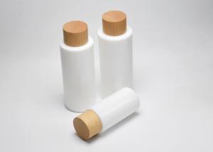 Quality BG-194Q-J, 40, 100, 120ml opaque white glass lotion bottle with wooden screw cap, luxury glass cosmeceutical packaging wholesale