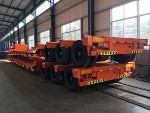 Quality 3 Axles Semi Lowbed Trailer 60000kg Semi Truck Flatbed Trailer wholesale