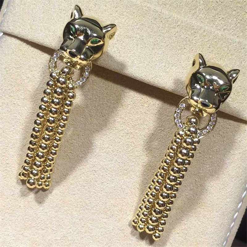 C earrings, 18K gold, inlaid with 34 round bright cut diamonds, Shafrey garnet leopard eyes, Onyx factory in China