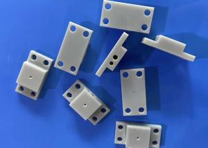 Quality Alumina Nitride Ceramic Parts 15KV/mm Dielectric Strength 4.5-5.5x10-6/K wholesale