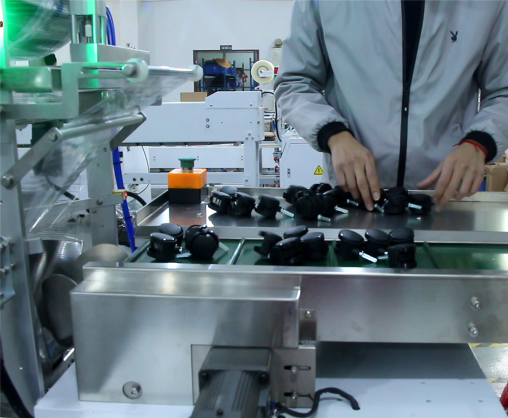 Semi-Automatic Sealing Bagging Casters Filling Bag Nuts Bolt Packaging Machine For Bolts