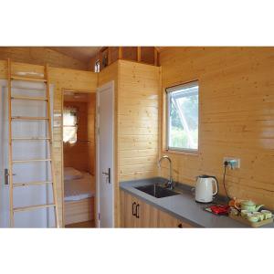 Quality Prefabricated Steel Frame Mini House With Laminate Flooring 110/220V/240v Electrical wholesale