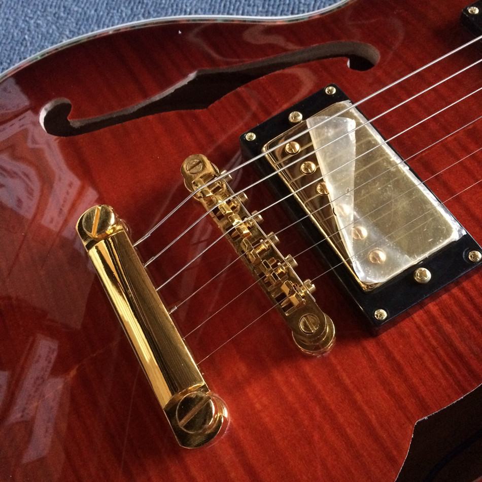 A new style of custom guitar, double F holes,Gold hardware,Flame Maple Top & Back