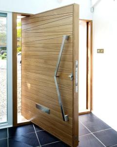 Quality Modern Front Door Solid Wood Pivot Entry Door With Frosted Glass wholesale