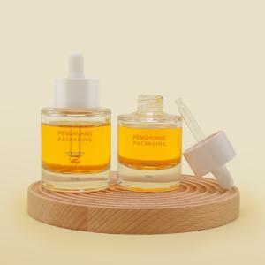 Quality OEM 1oz Glass Oil Serum Dropper Bottles 50ml Flat Shoulder wholesale