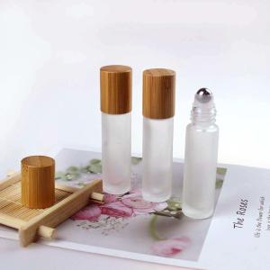 Quality Wood Grain Bamboo Cap 3ml 5ml 10ml Frosted Roller Bottles With Stainless Roller Ball wholesale