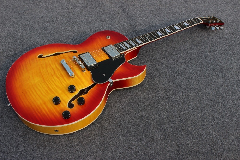 Hollow body ES137 jazz guitar with cherry burst color and chrome hardware