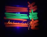 mini fluorescent golf putter in black light (glow in uv light ), mini golf
