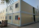 Yellow And White Storage Container Houses Two Layers With Internal Stairs