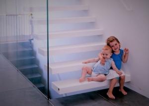 Quality Walnut Wood Treads Floating Steps Staircase Tempered Glass Railing Residential Usage wholesale