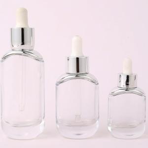 China Oval Glass Empty Dropper Bottles Clear Skin Care Essential Oil Customized Logo on sale
