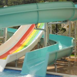 Quality Fiberglass Hotel Water Slide Fun 500lbs Weight Capacity 1-2 People Curved Shape wholesale