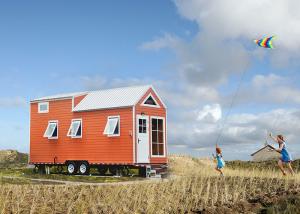 Quality Mini Lightweight Prefabricated Tiny House Hotel Unit Orange Black Mobile House on Wheels for Travel wholesale