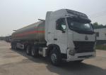 HOWO A7 Fuel Oil Delivery Semi Truck With Trailer 60000 Liters 65000 kgs