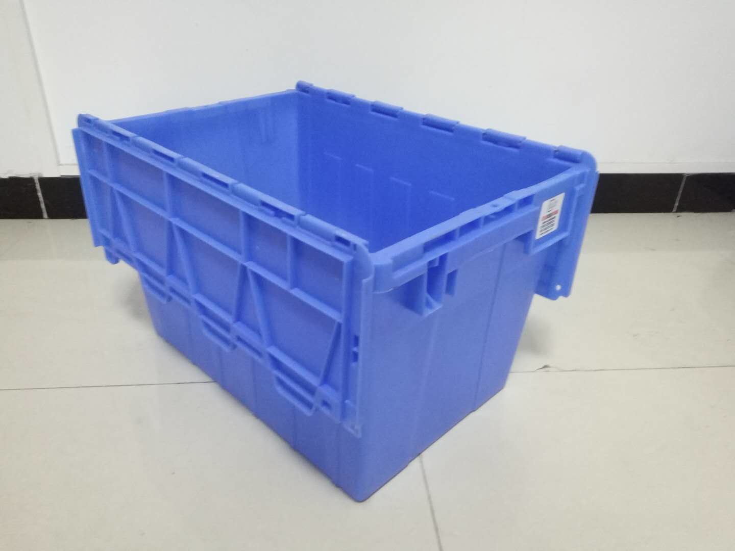 Yellow Plastic Storage Bins Attached Lids Stacked For Transportation