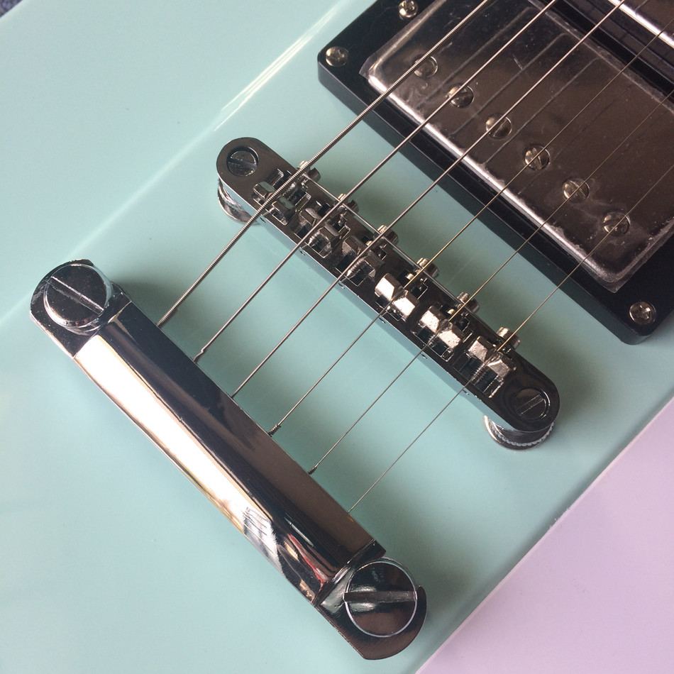 High quality custom electric guitar, rosewood fingerboard, Light green electric guitar