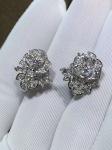 Piaget brand jewelry 18kt Piaget Rose earrings in 18K white gold set with 72