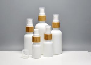Quality Glass Skin Essence Oil Packaging Opal White Glass Bottles With Bamboo Pump Spray, Glass Primary Cosmetic Containers wholesale
