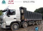 HOWO A7 10X4 14 Wheeler Truck 35CBM Euro IV Low Oil Consumption With Lifting