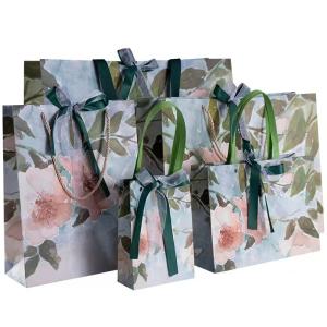 Quality Logo Printed Cosmetic 230gsm Present Paper Bags Twisted Rope Handle Paper Bags wholesale